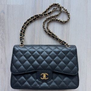 Chanel
Black Quilted Caviar Leather Jumbo Classic Double Flap Bag